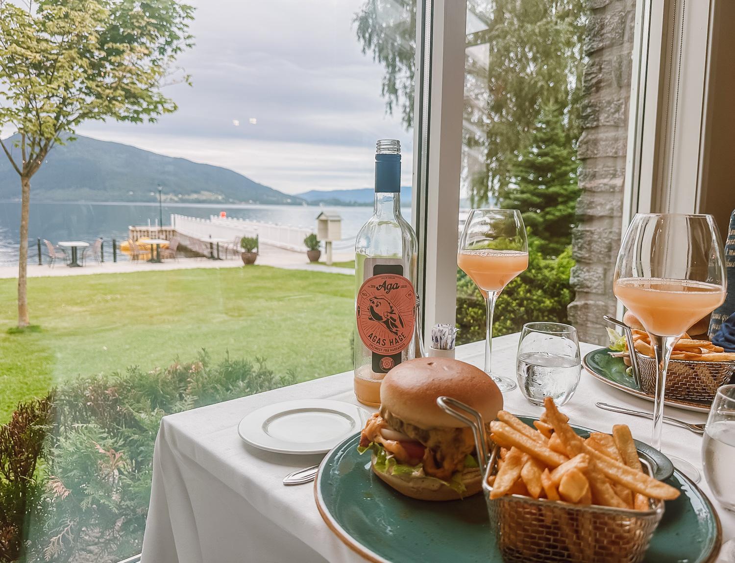 Hamburger and apple cider at Rosendal Fjordhotel restaurant in Hardangerfjord, Norway