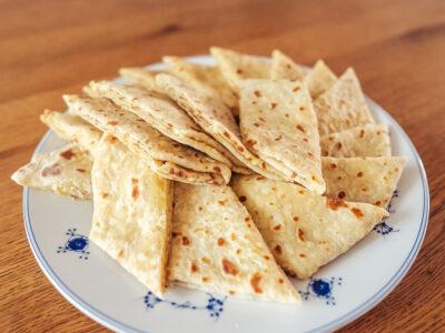 Norwegian lefse with kling (butter and sugar filling) arranged on a plate